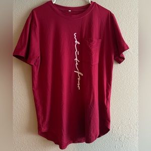 Red shirt with cursive lettering